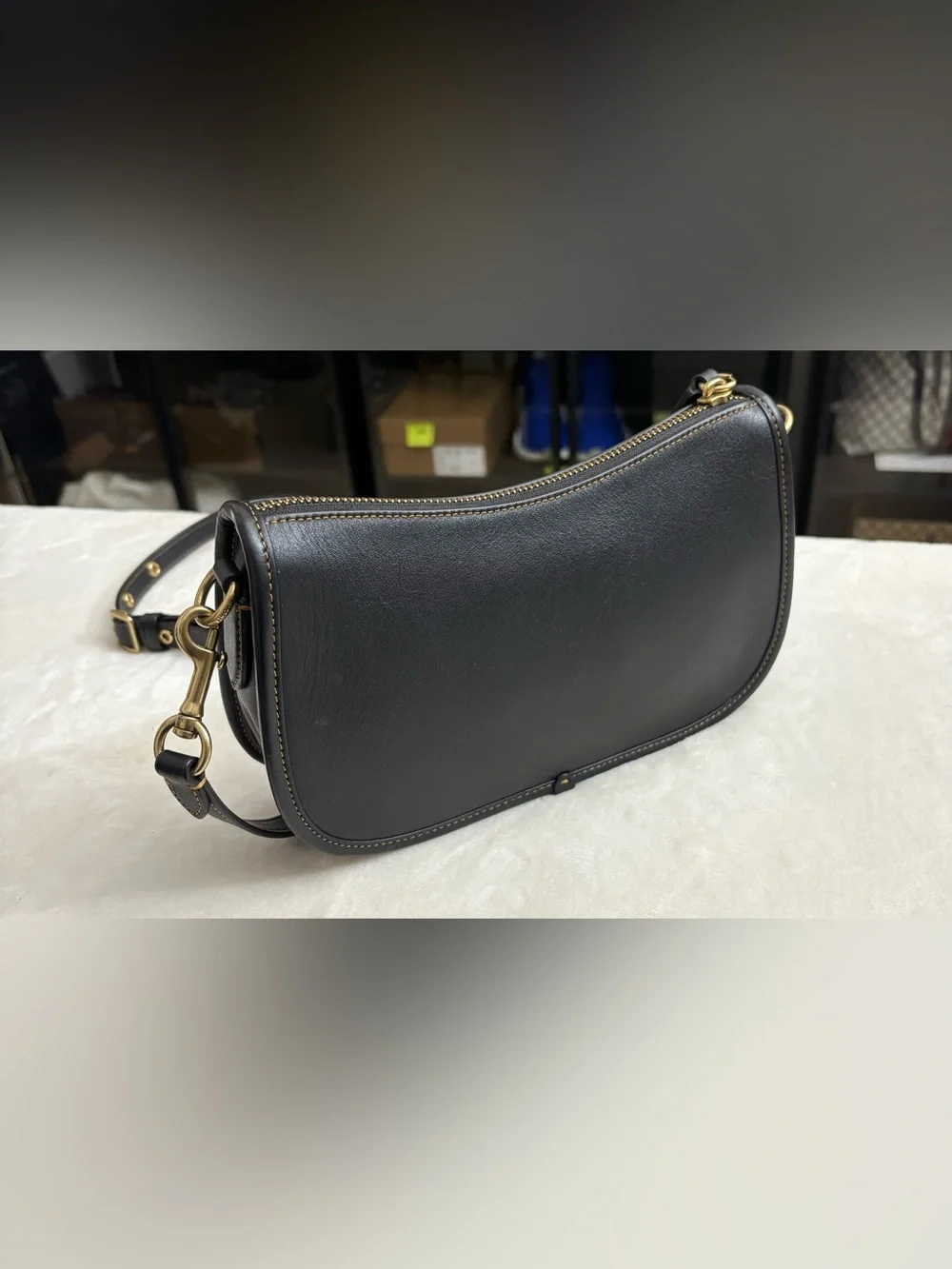 Coach Black Swinger Glove-Tanned Leather Crossbody Bag.